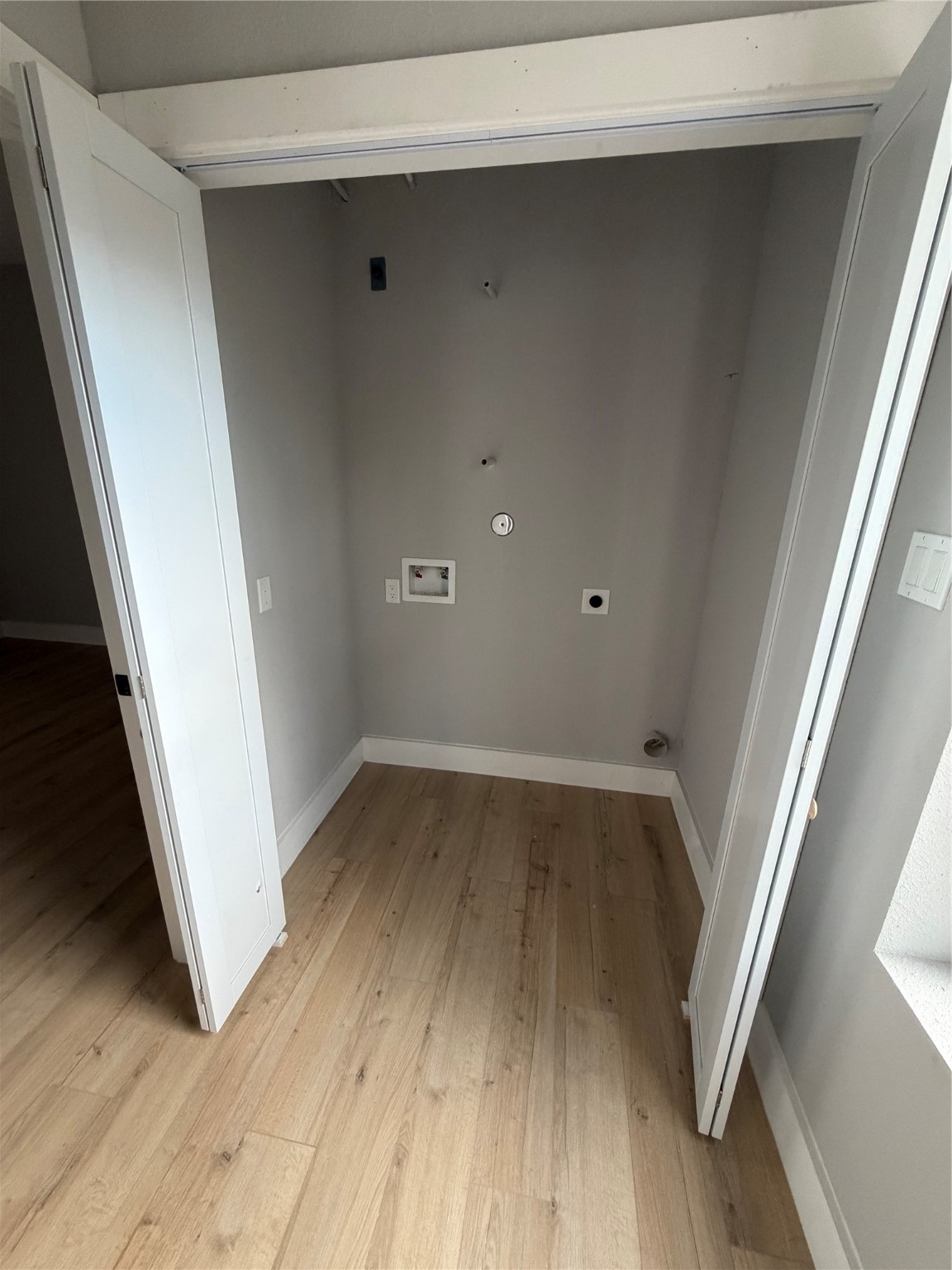 9914 Fillmore Street Houston, TX 77029 - Photo 9 of 11 a view of a room with wooden floor and stairs