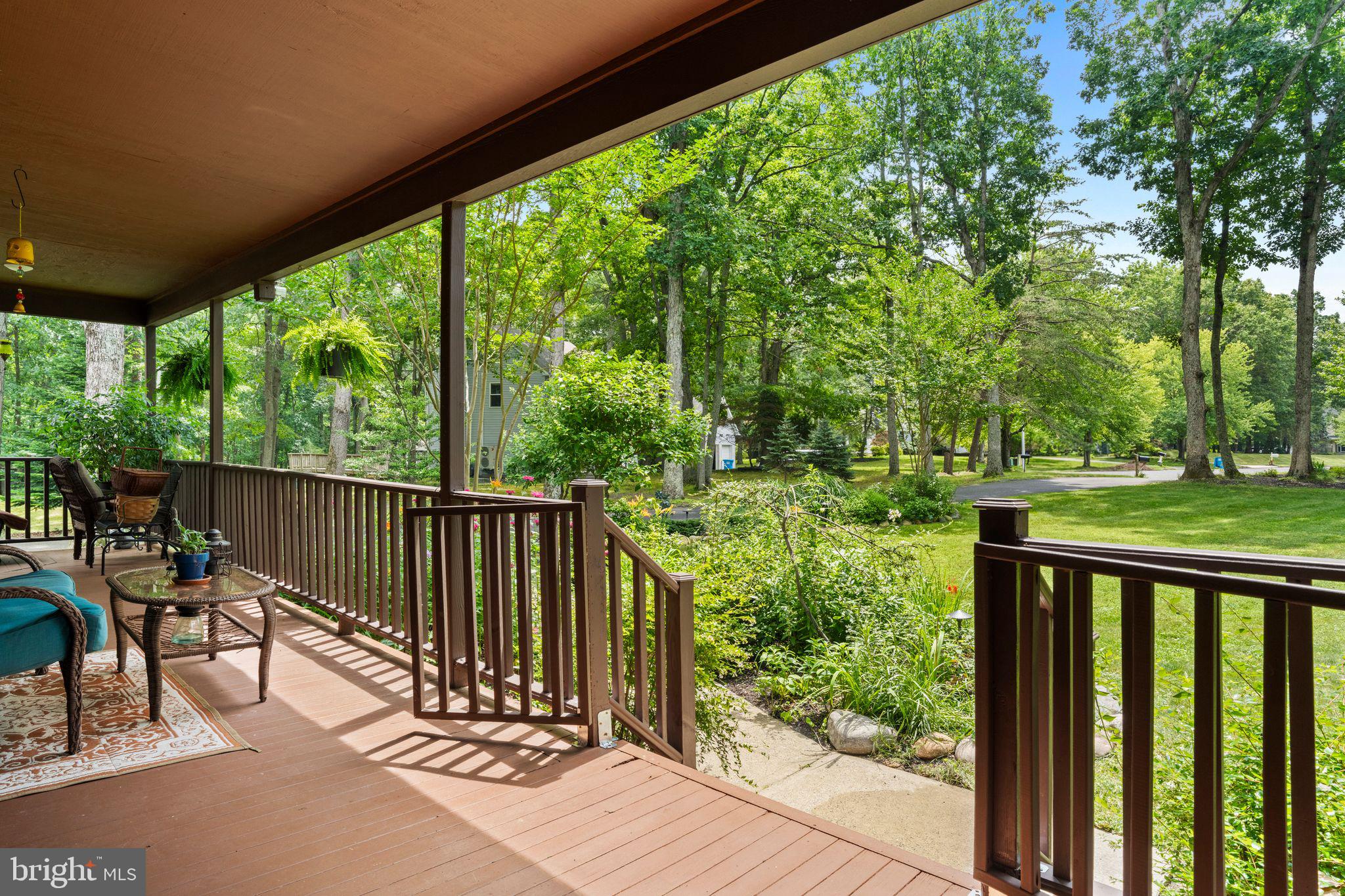 16 Dunhill Road Jackson, NJ 08527 - Photo 3 of 44 Serene porch with lush green views.