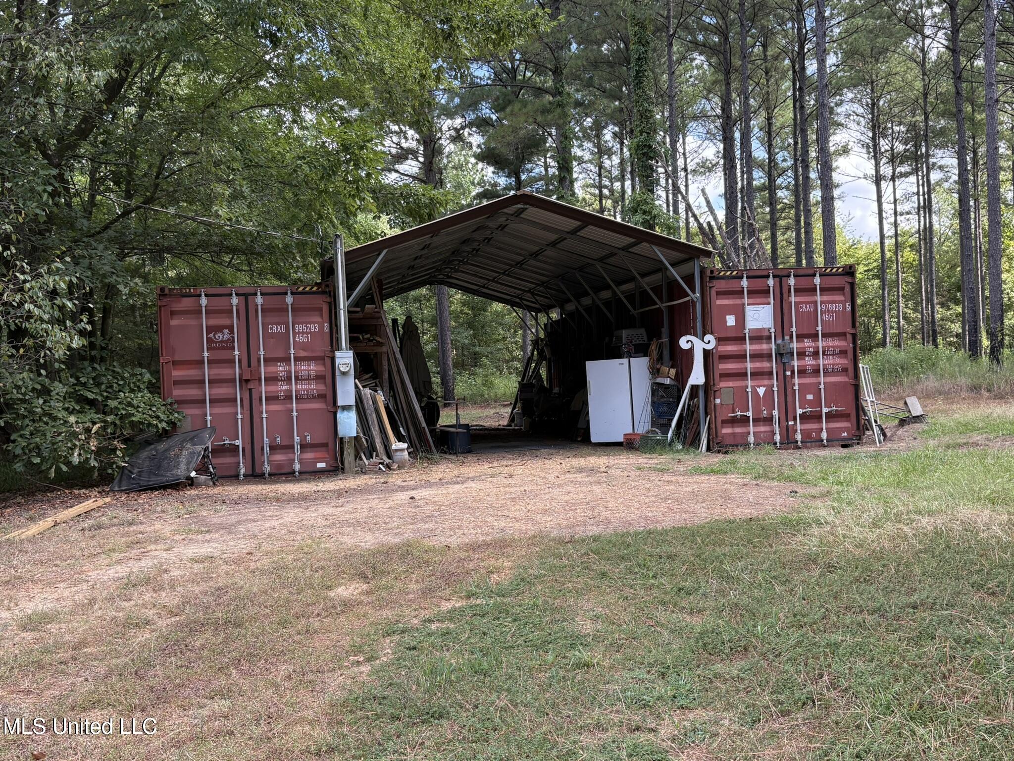 333 Paul White Road Como, MS 38619 - Photo 34 of 53 333 Paul White RD Shed and containers2