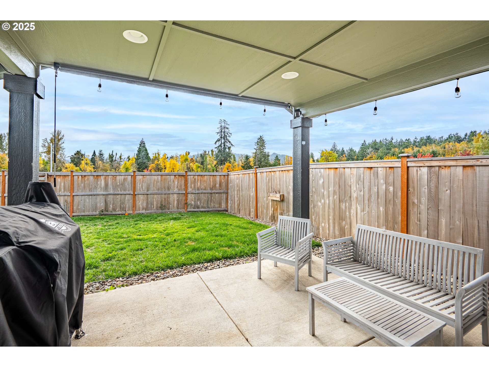 4967 Cedar View Drive Springfield, OR 97478 - Photo 17 of 22 a view of a patio with a table chairs and a couple of chairs
