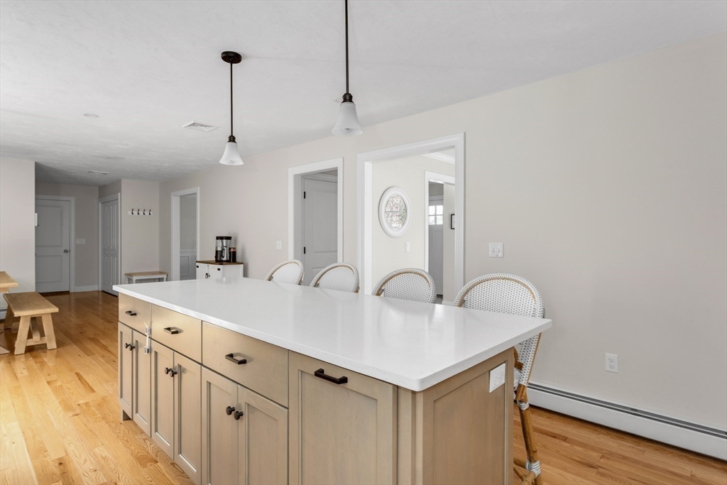 56 Fuller Place Franklin, MA 02038 - Photo 11 of 42 a open kitchen with stainless steel appliances granite countertop a sink and dishwasher