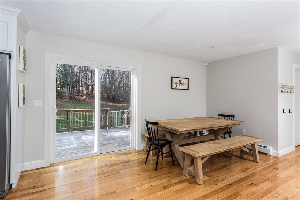 56 Fuller Place Franklin, MA 02038 - Photo 14 of 42 a room with wooden floor and a window