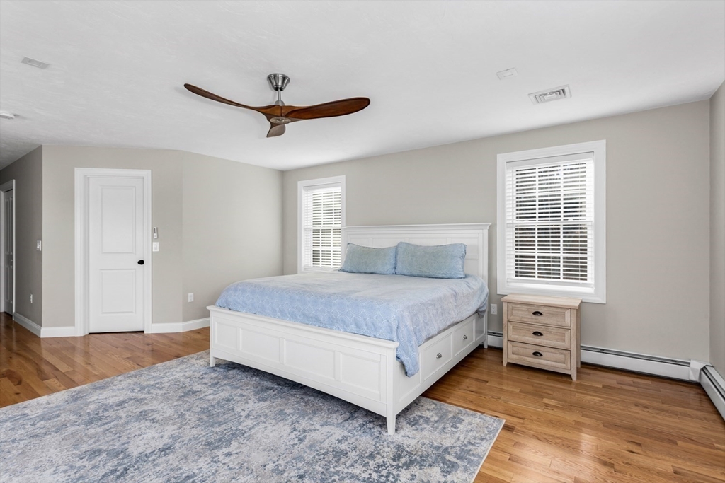 56 Fuller Place Franklin, MA 02038 - Photo 21 of 42 a bedroom with a bed and window