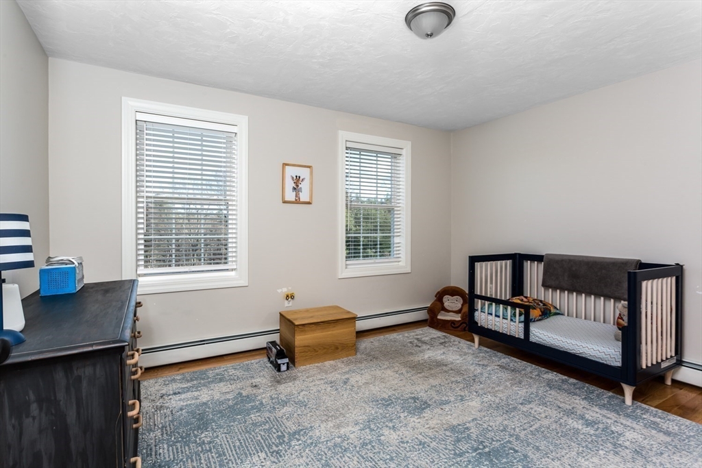 56 Fuller Place Franklin, MA 02038 - Photo 26 of 42 a view of a livingroom with furniture and a window