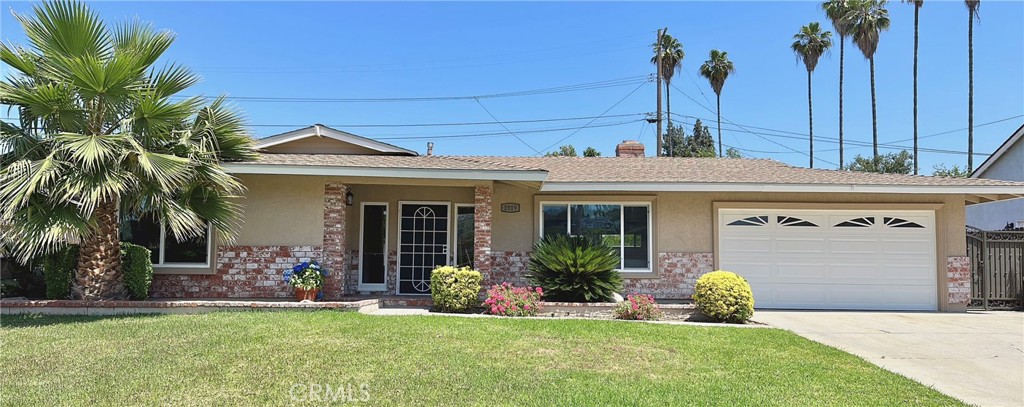 2519 Castle Rock Road Diamond Bar, CA 91765 - Photo 1 of 1 a front view of a house with a garden and plants