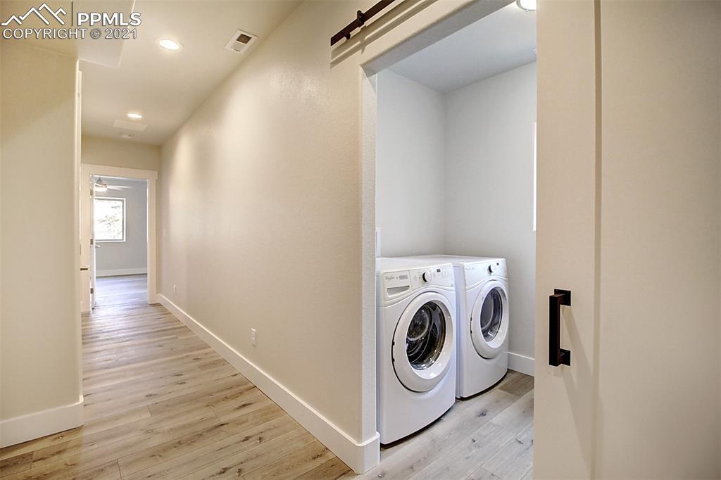 196 Shannon Place Divide, CO 80814 - Photo 14 of 25 a view of a hallway with washer and dryer