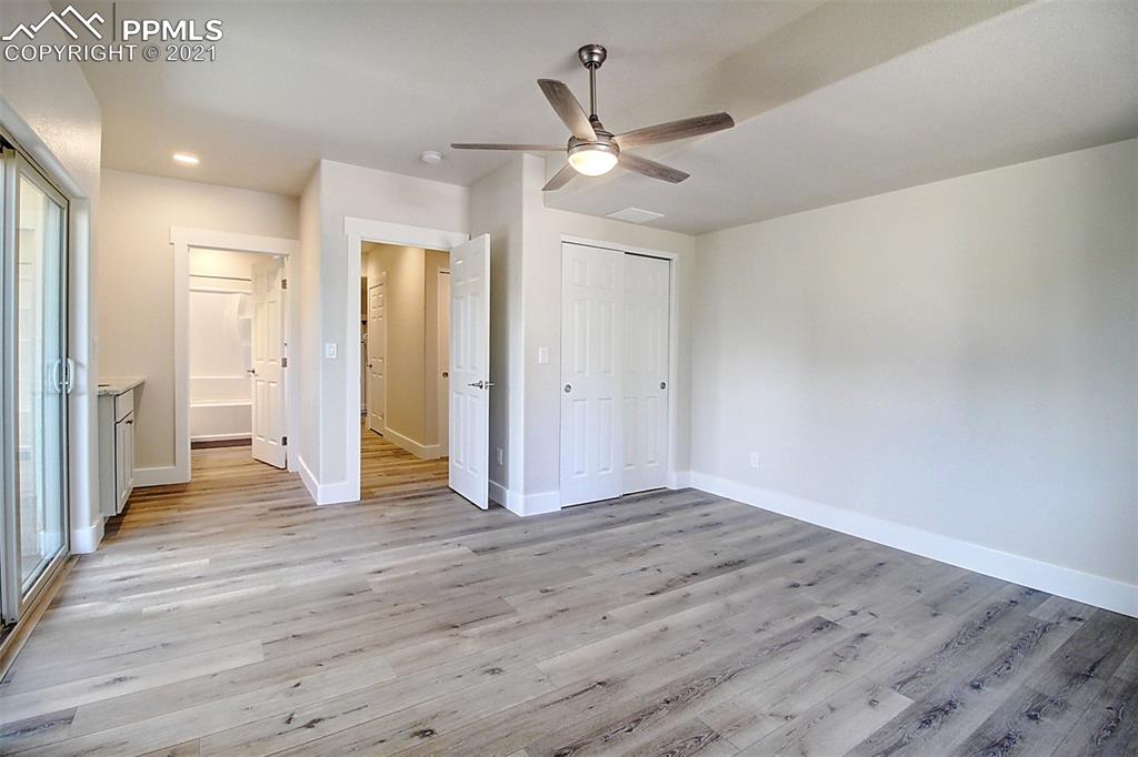 196 Shannon Place Divide, CO 80814 - Photo 16 of 25 a view of empty room with wooden floor