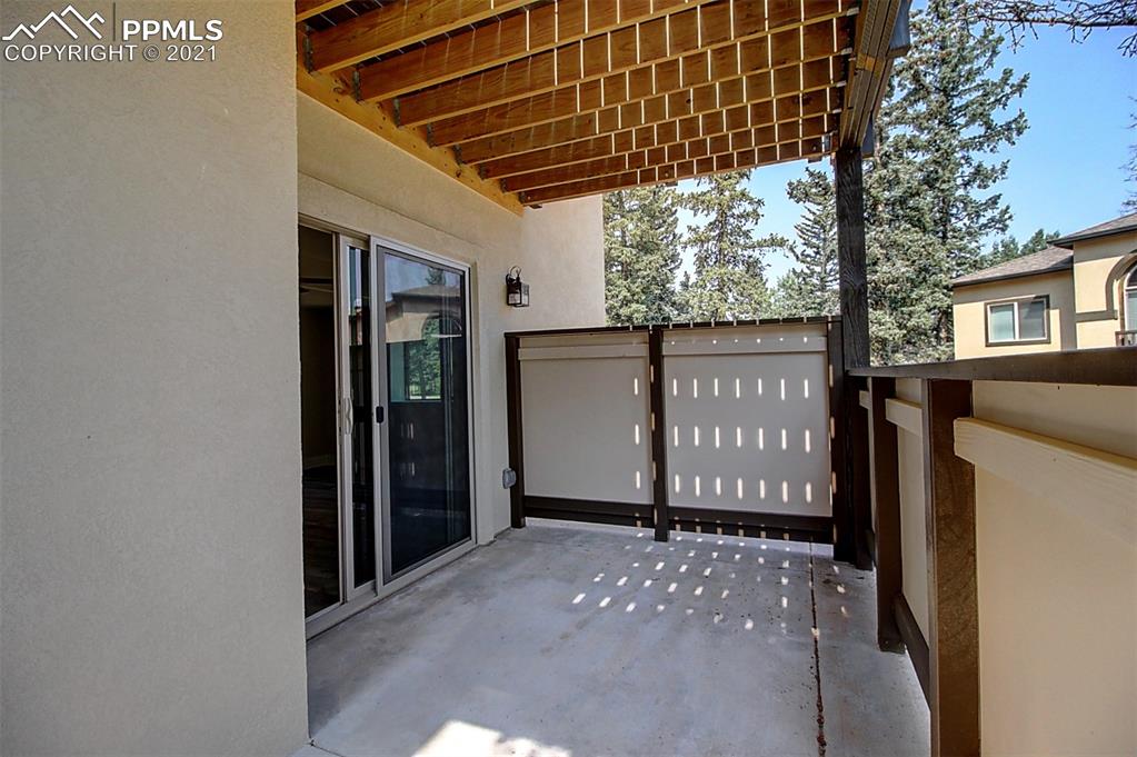 196 Shannon Place Divide, CO 80814 - Photo 22 of 25 a view of a blue door with a street sign