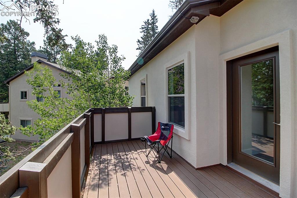 196 Shannon Place Divide, CO 80814 - Photo 24 of 25 a view of balcony with furniture and wooden floor