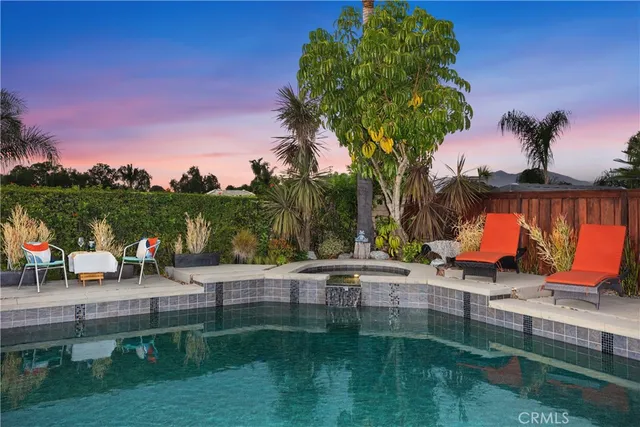 a view of a park with large trees