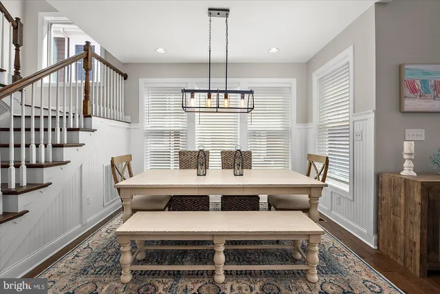 a bathroom with a sink a mirror and vanity