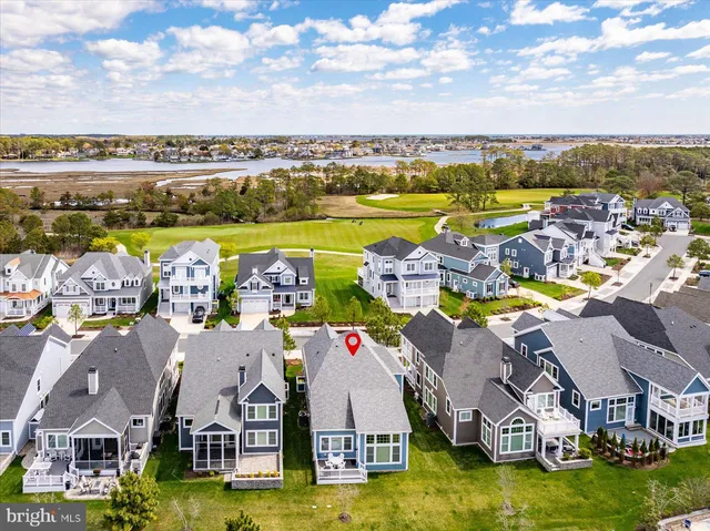 a view of a house with entryway and wooden floor