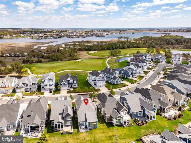 a view of swimming pool with outdoor seating