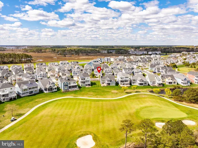 a view of a two chairs and a table in a yard