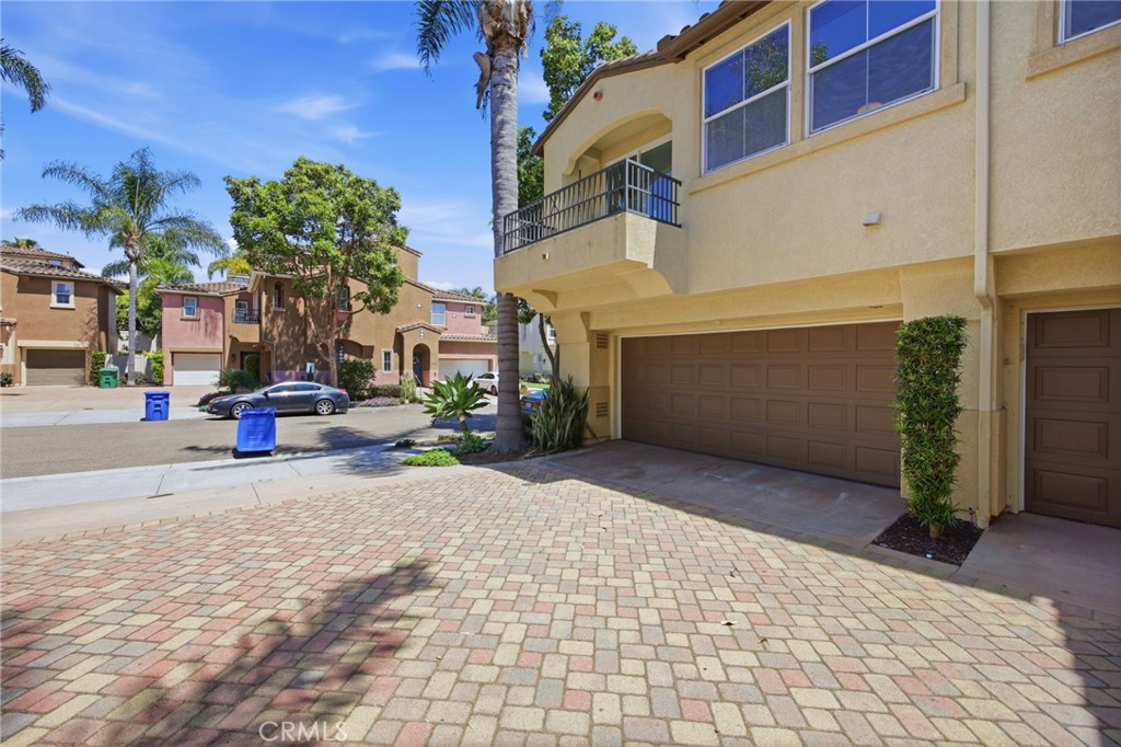 3603 Jetty Carlsbad, CA 92010 - Photo 3 of 43 a view of a building with a street