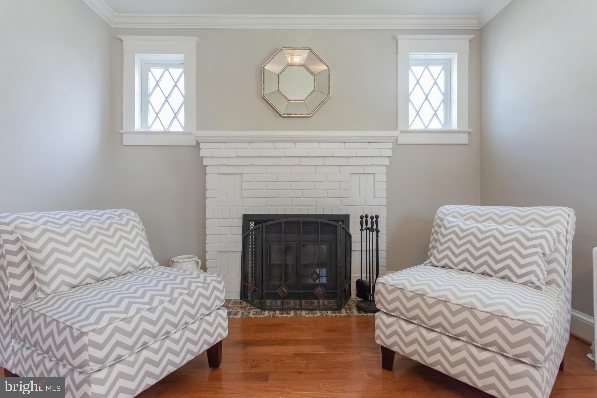 2531 Key Boulevard Arlington, VA 22201 - Photo 4 of 19 a bedroom with a bed and a fireplace