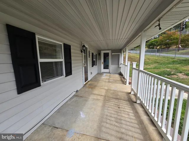 a view of a house with a porch