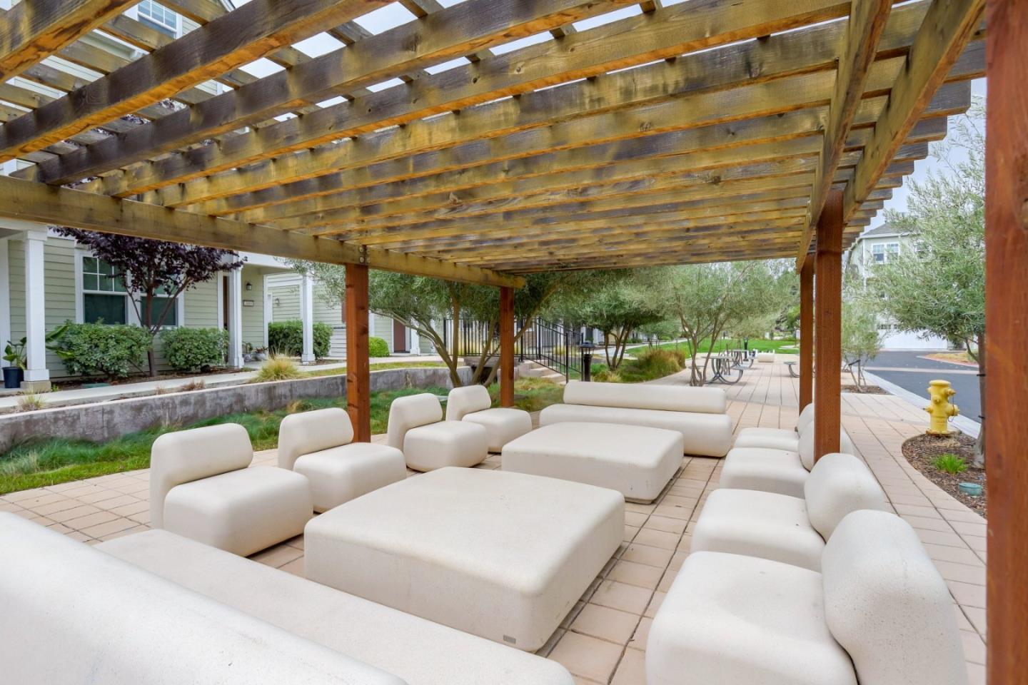 141 Orbit Way Mountain View, CA 94043 - Photo 13 of 14 a living room with patio furniture and garden view