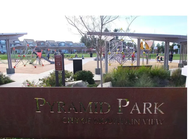 a view of a street with a building in the background