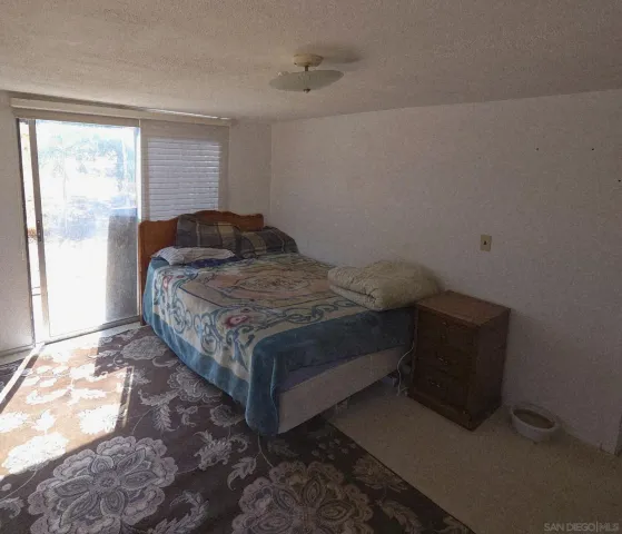 a view of balcony with furniture