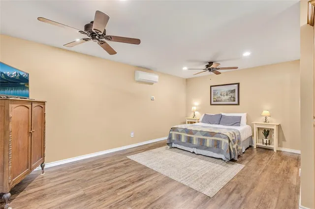 a bedroom with a bed and a table