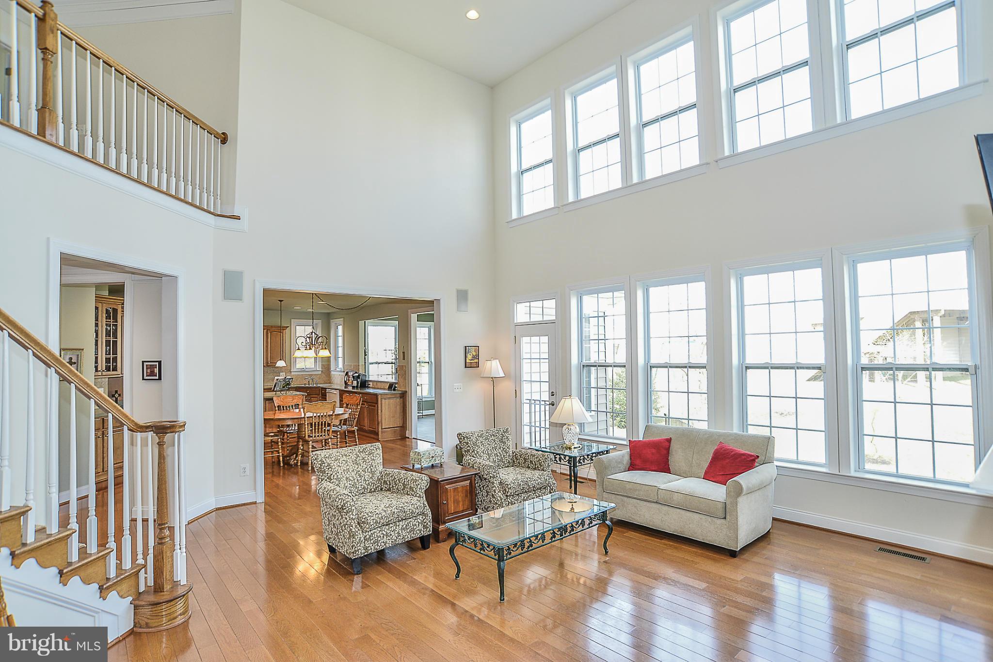 7714 Huntsman Boulevard Springfield, VA 22153 - Photo 3 of 30 2 story sun-lit family room