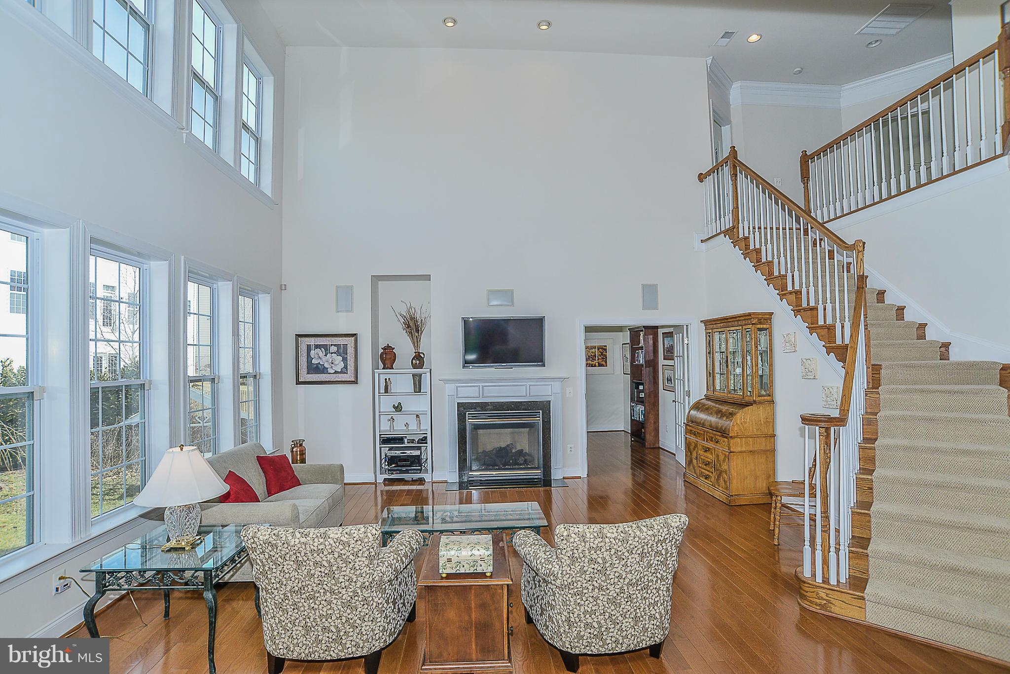 7714 Huntsman Boulevard Springfield, VA 22153 - Photo 6 of 30 Family Room with back staircase