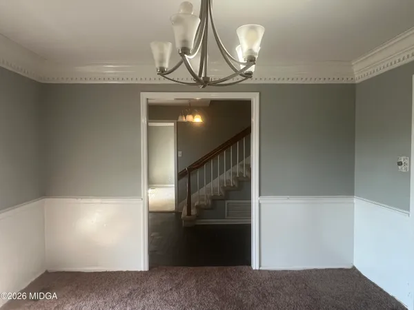 a view of a hallway to a room