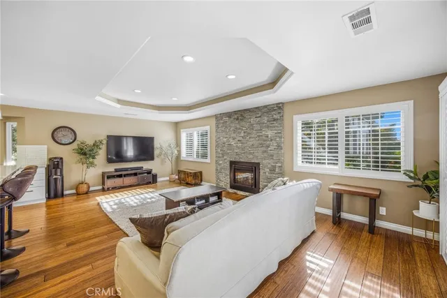 a bathroom with a sink vanity and mirror
