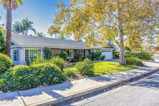 a living room with furniture and fireplace