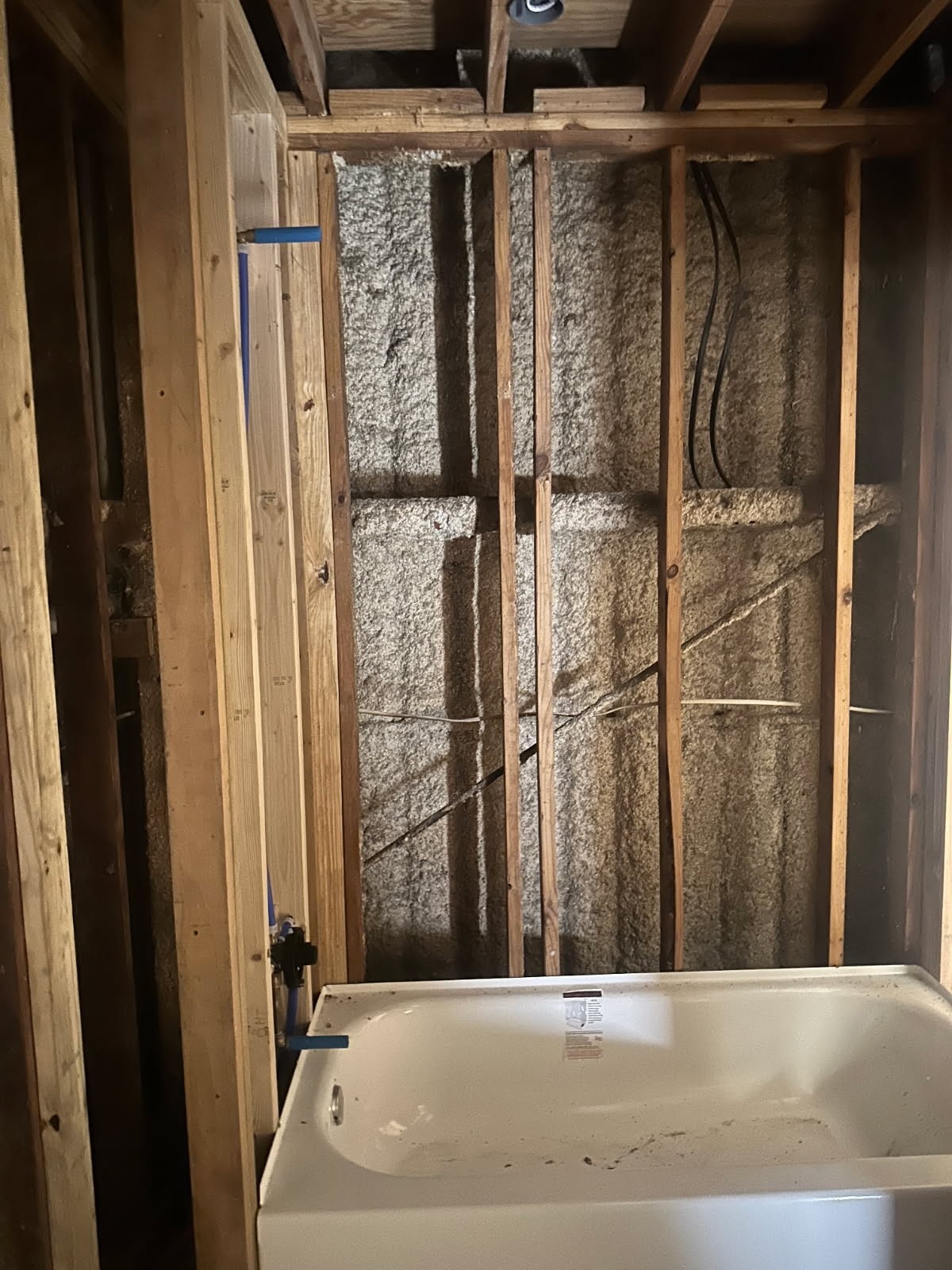 20 Red Tip Lane Brenham, TX 77833 - Photo 17 of 27 a bathroom with a shower and a tub