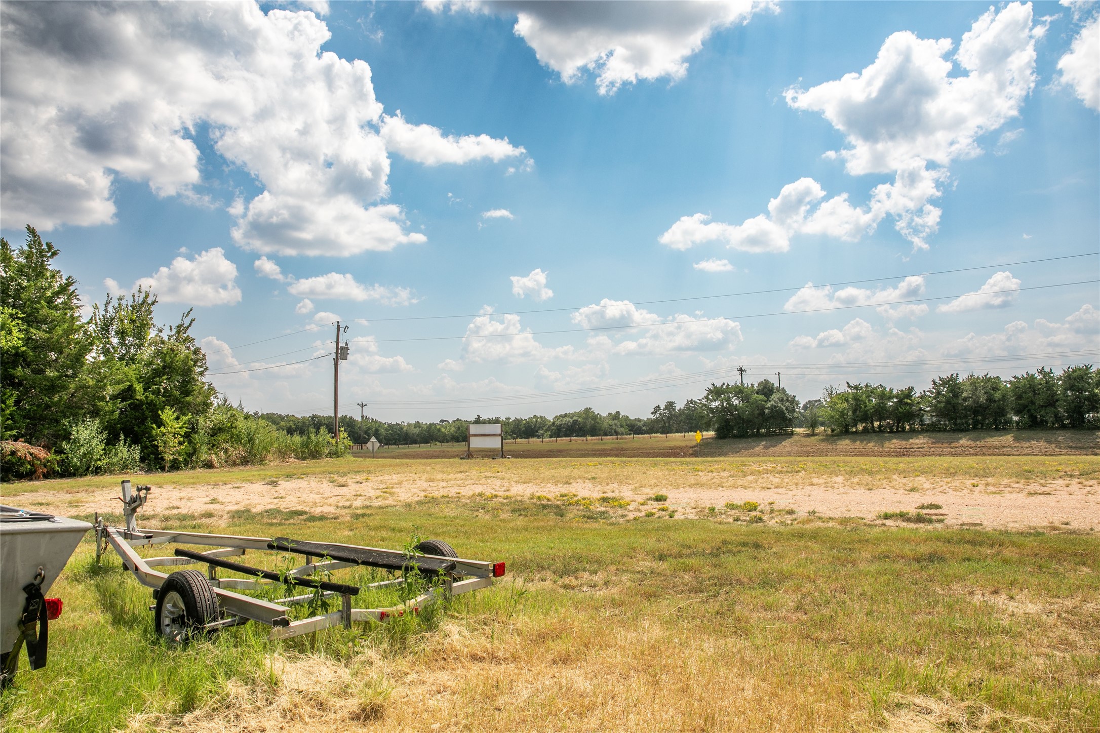 20 Red Tip Lane Brenham, TX 77833 - Photo 20 of 27 a view of a swimming pool with an ocean view