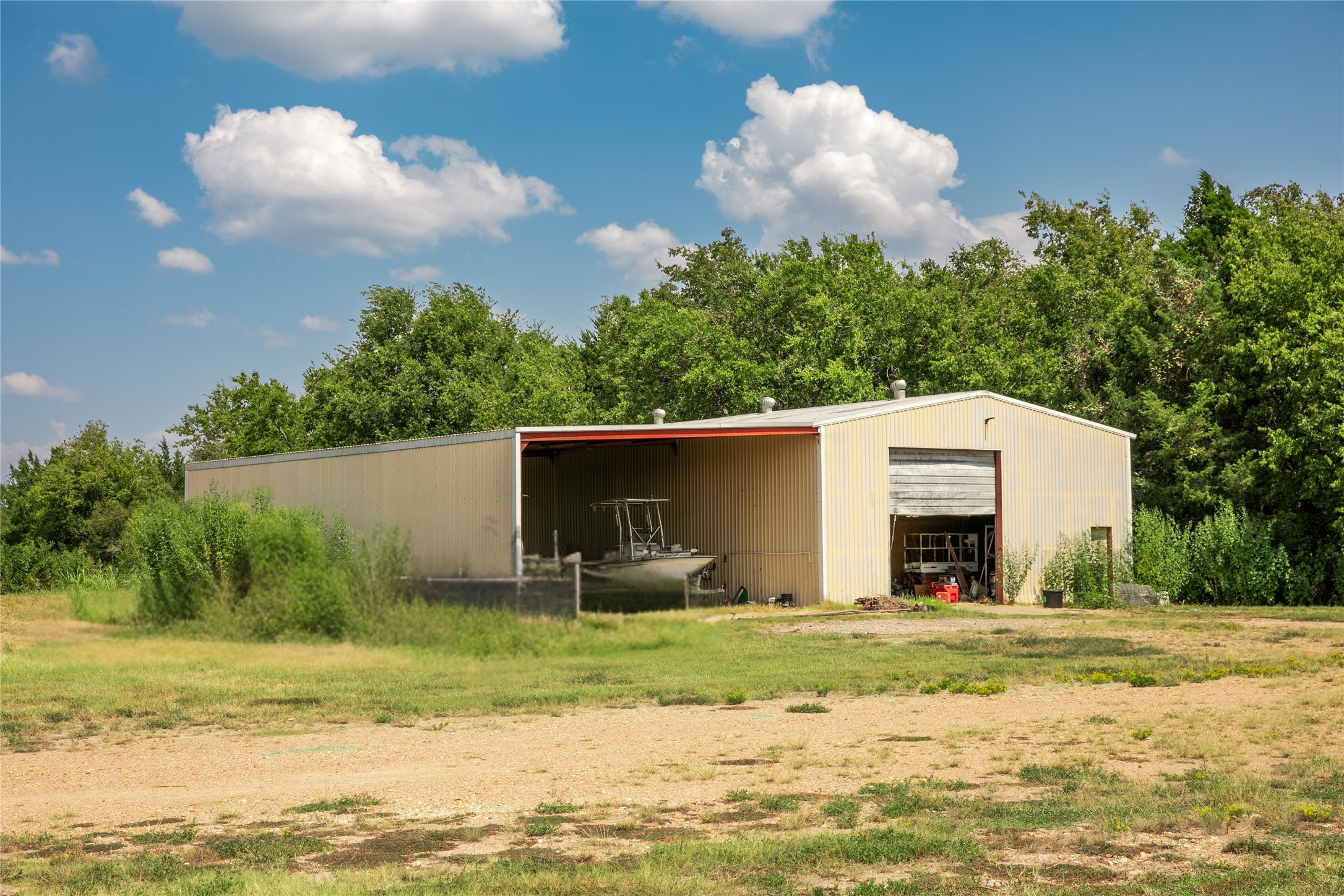 20 Red Tip Lane Brenham, TX 77833 - Photo 2 of 27 a house view with a garden space