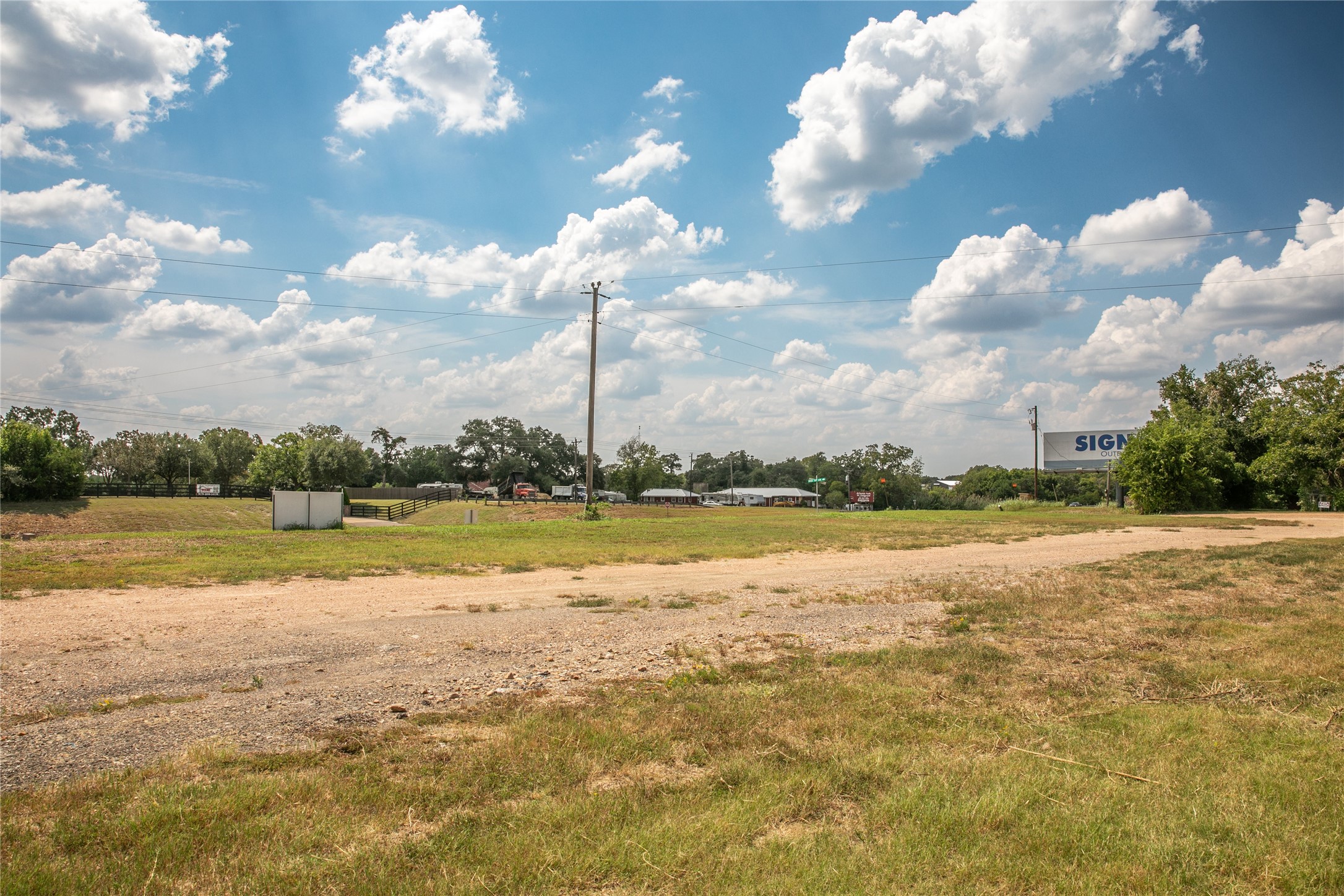 20 Red Tip Lane Brenham, TX 77833 - Photo 24 of 27 a view of a lake and houses in the background