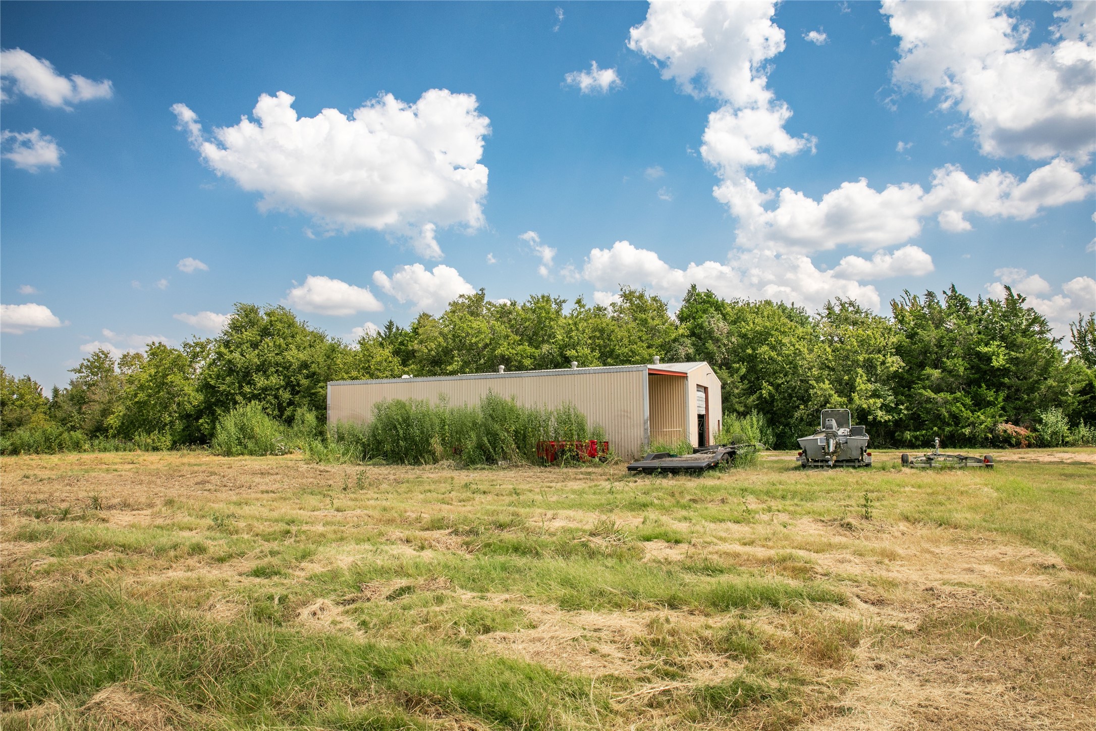 20 Red Tip Lane Brenham, TX 77833 - Photo 6 of 27 a view of a yard with a house