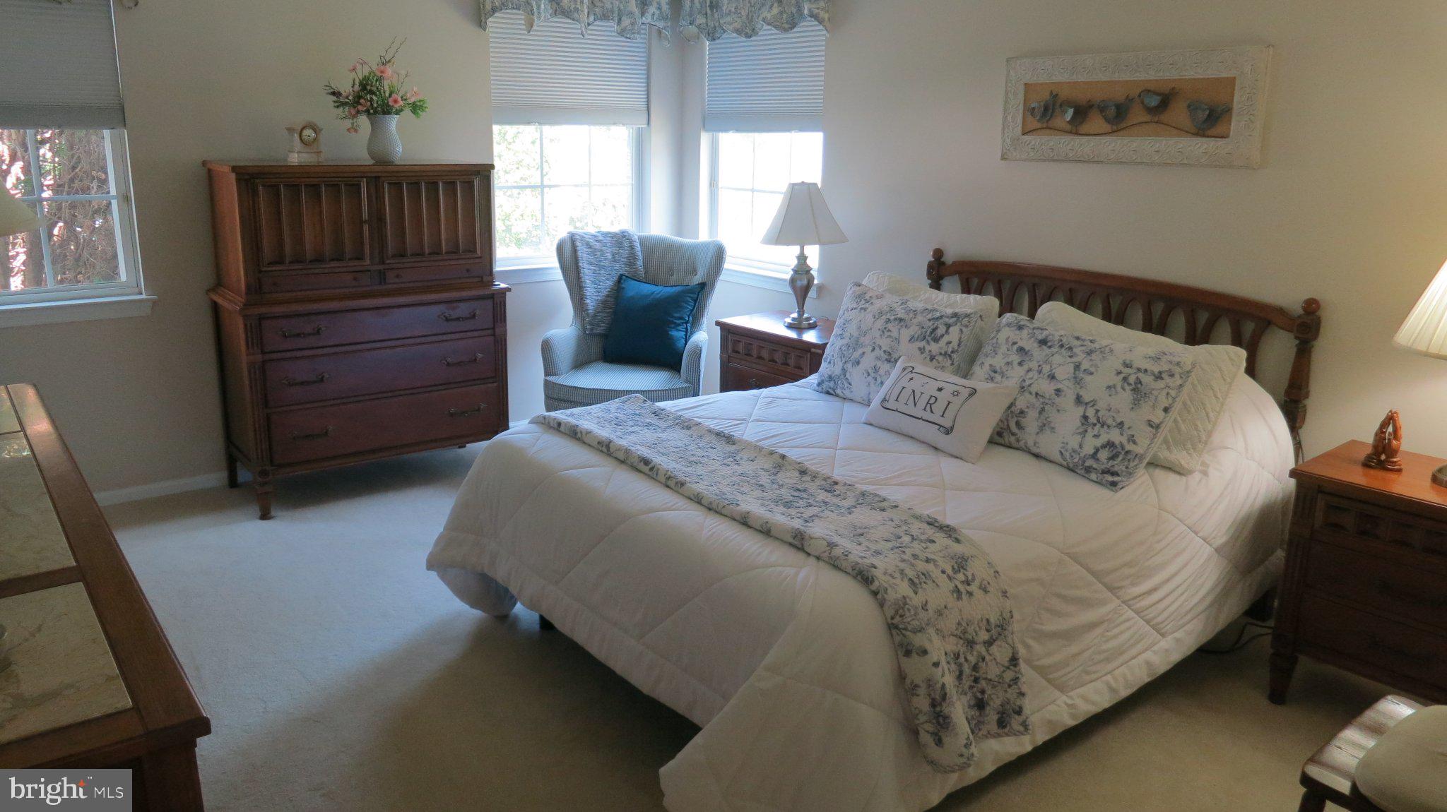 25 Chickadee Way Hamilton, NJ 08690 - Photo 23 of 26 a bedroom with a bed and furniture