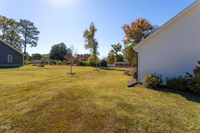 a view of swimming pool with an outdoor space and seating area