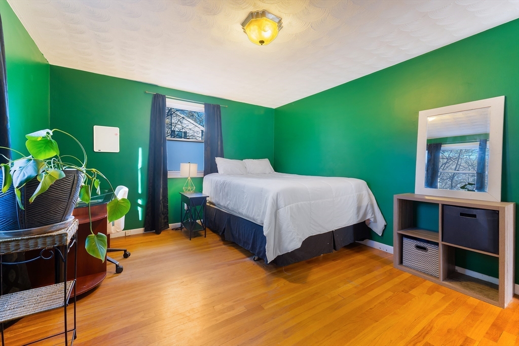 3 Riverside Road Billerica, MA 01821 - Photo 14 of 42 a bedroom with a bed table and a window