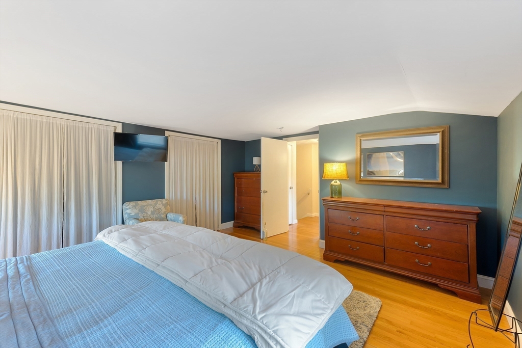 3 Riverside Road Billerica, MA 01821 - Photo 18 of 42 a bedroom with a bed and a dresser