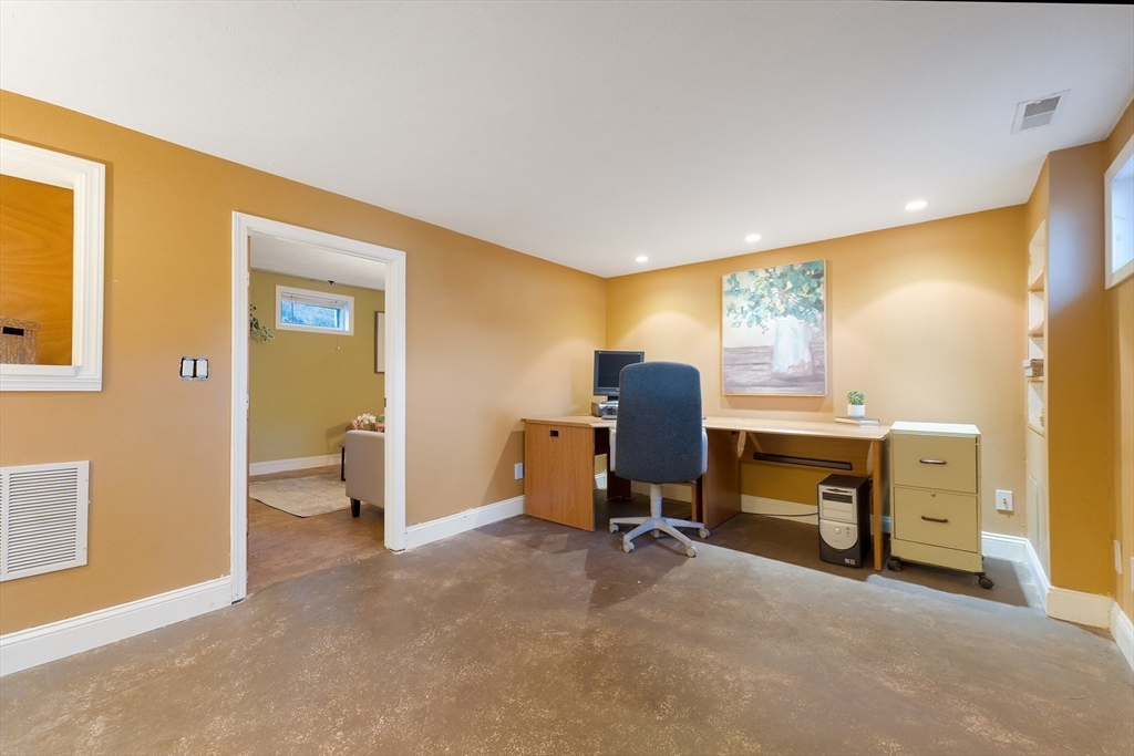 3 Riverside Road Billerica, MA 01821 - Photo 25 of 42 a view of a workspace with furniture and a window