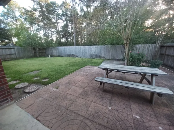 a view of a bench in a yard