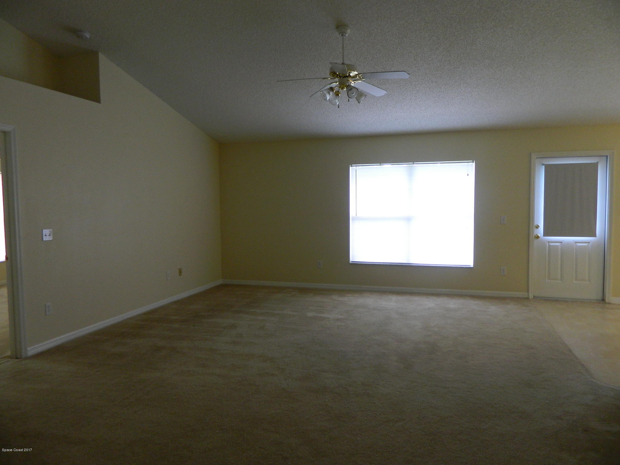3256 Reef Road Southeast Palm Bay, FL 32909 - Photo 11 of 22 Family Room