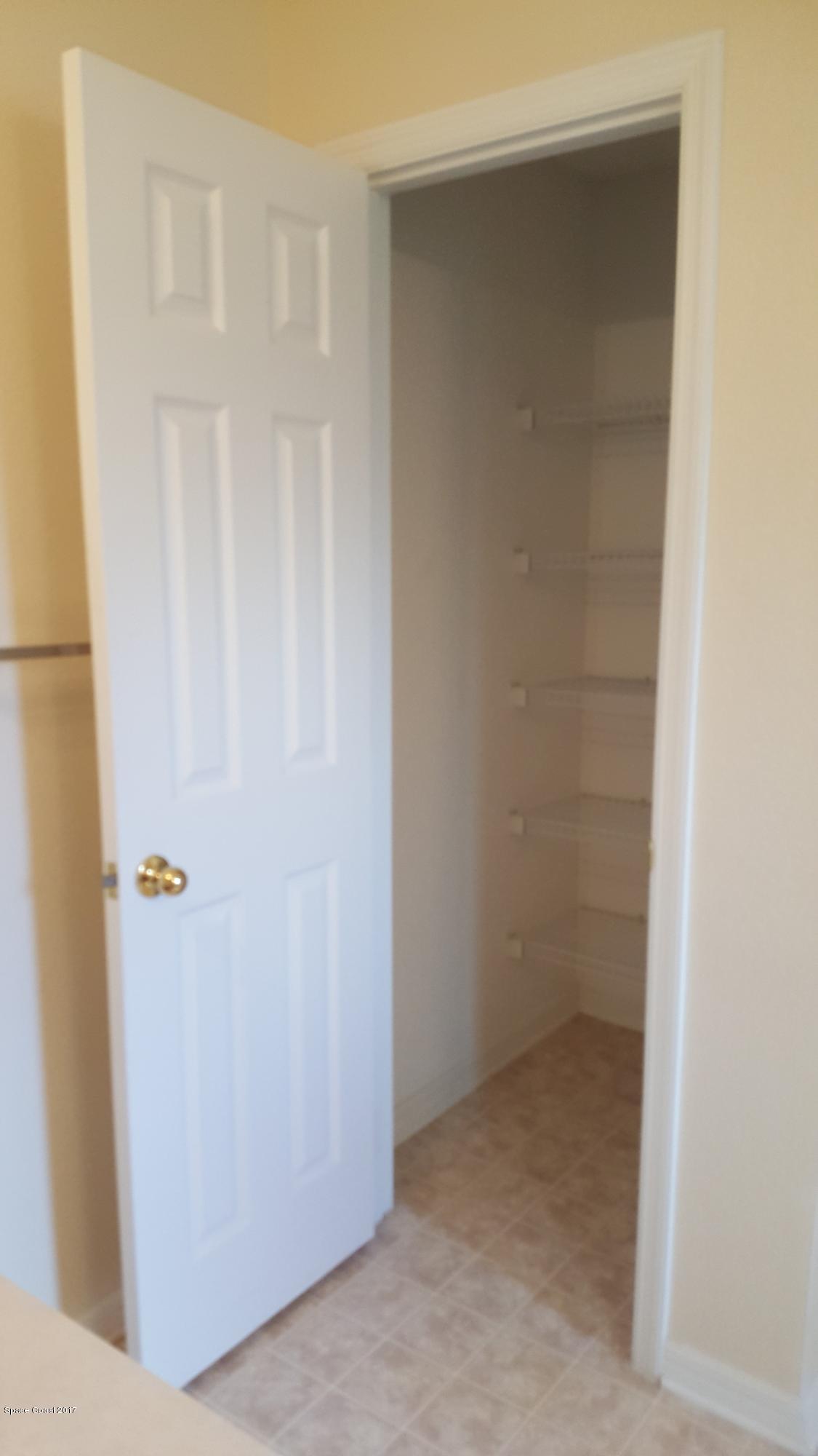3256 Reef Road Southeast Palm Bay, FL 32909 - Photo 14 of 22 His & Hers walk in closets