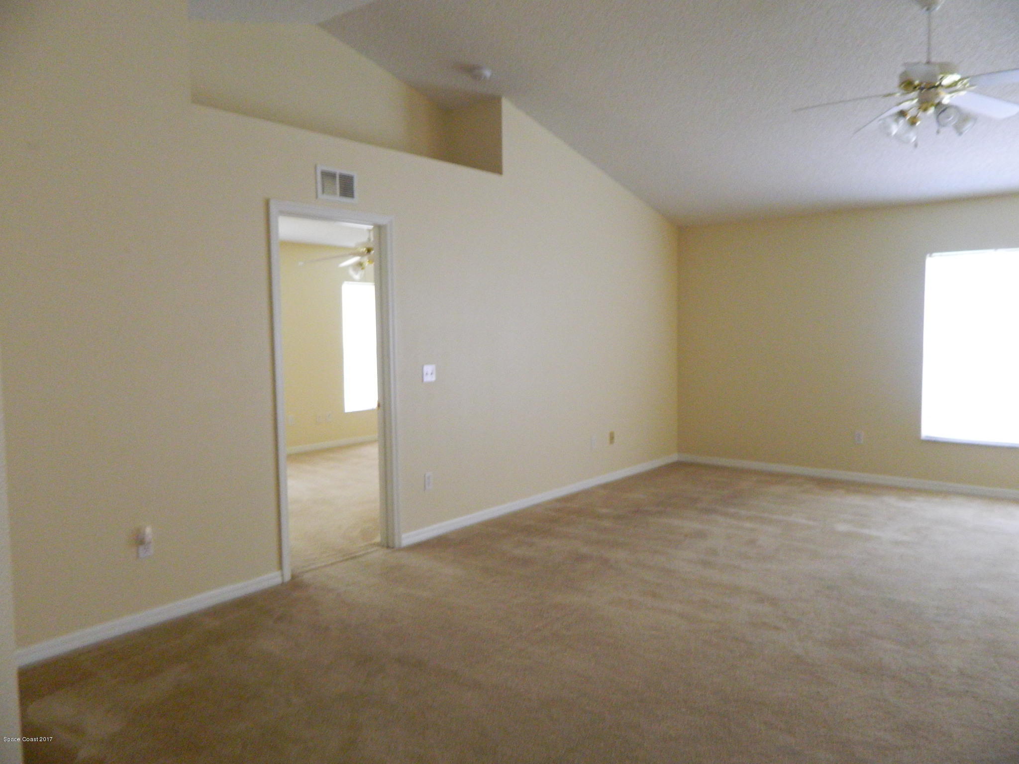 3256 Reef Road Southeast Palm Bay, FL 32909 - Photo 10 of 22 Family room