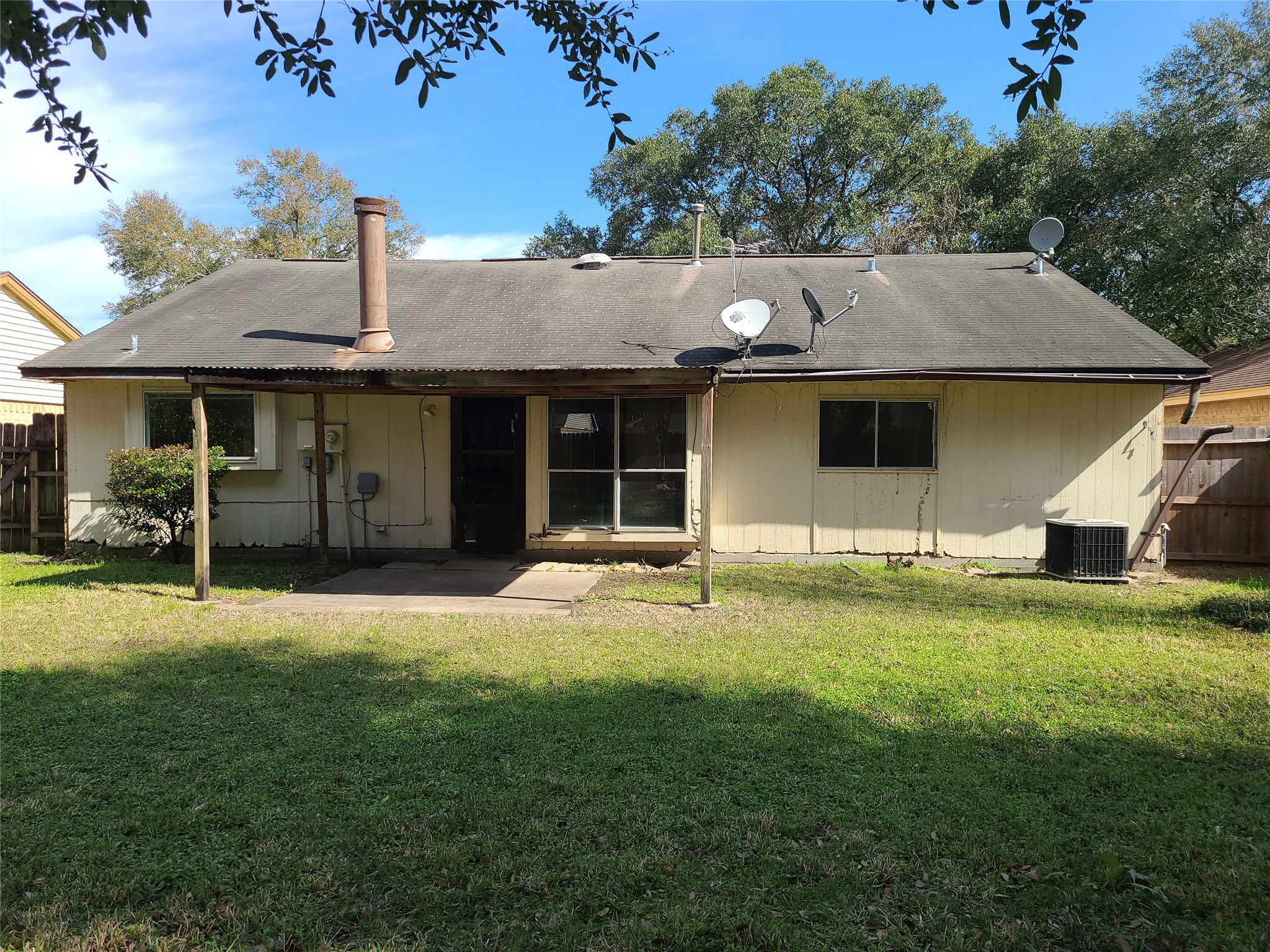 24127 Spring Towne Drive Spring, TX 77373 - Photo 19 of 20 a front view of a house with a yard