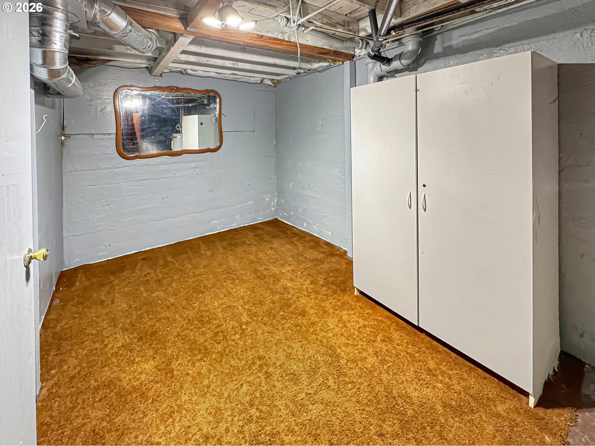 9310 Northeast Burton Road Vancouver, WA 98662 - Photo 12 of 24 a view of a room with a white wall and door