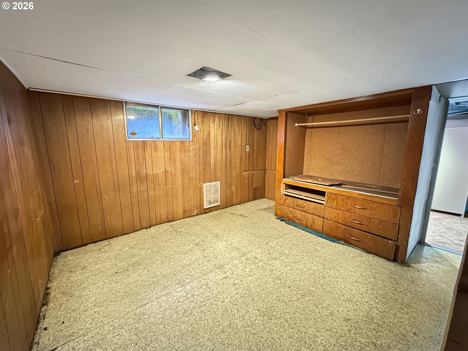 9310 Northeast Burton Road Vancouver, WA 98662 - Photo 13 of 24 a bed room with a bed and a television