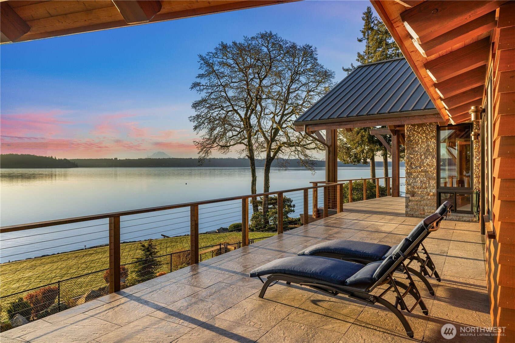 560 Cronquist Road Allyn, WA 98524 - Photo 17 of 39 a view of swimming pool with seating area and barbeque oven in the back