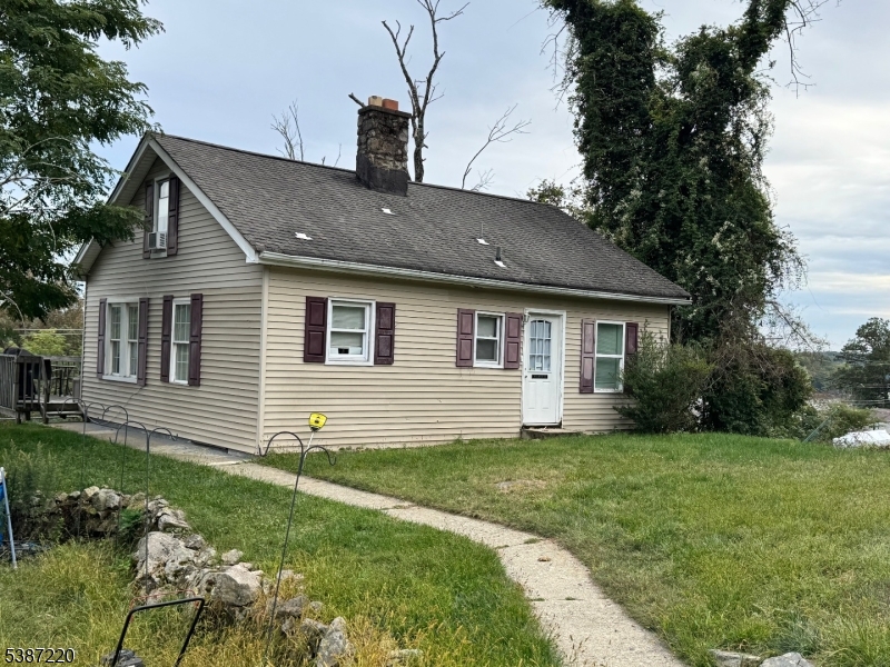 8 Hopatcong Street Hopatcong, NJ 07821 - Photo 3 of 22 a front view of house with yard and green space