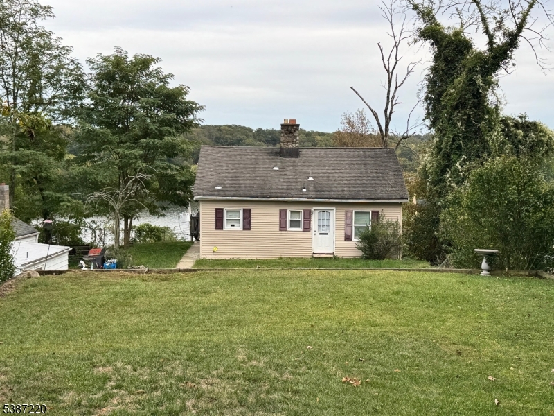 8 Hopatcong Street Hopatcong, NJ 07821 - Photo 7 of 22 a view of a house with a big yard and large trees